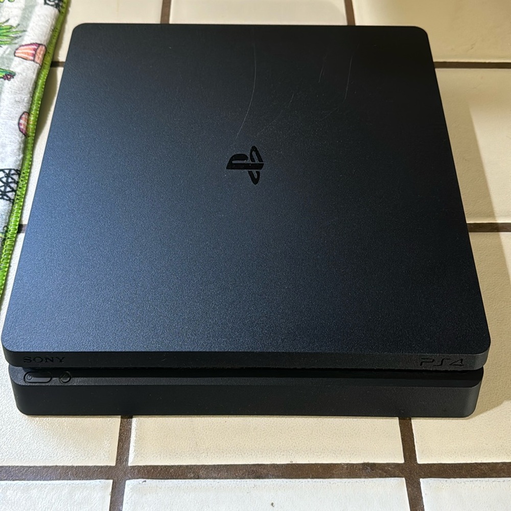 PS4 Console and one controller